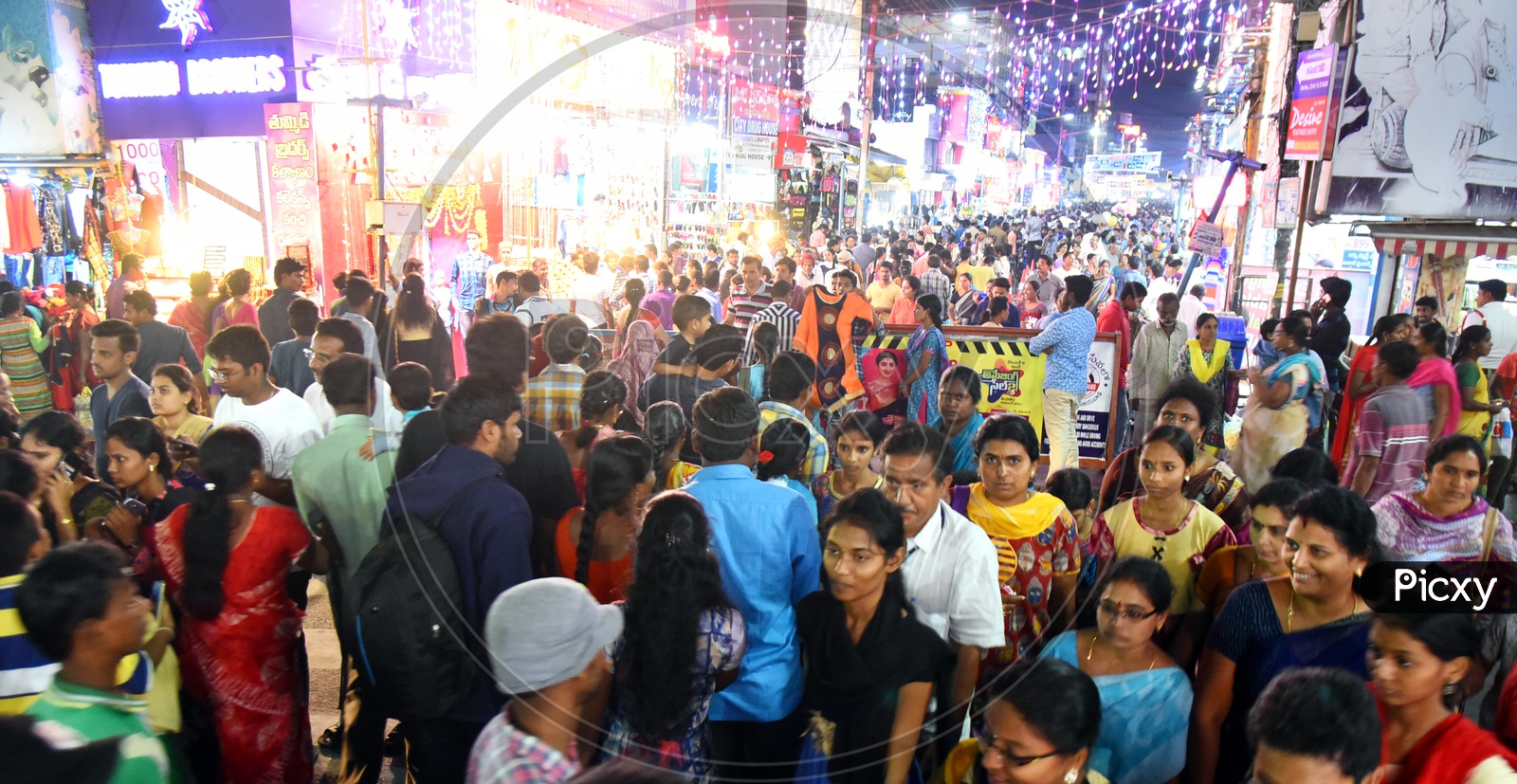 Crowd in a bazaar during the night