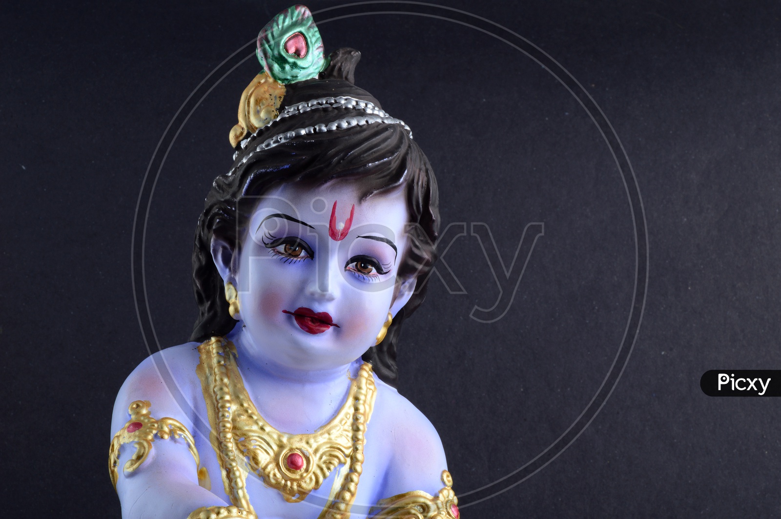Image of Little Krishna Idol on black background-MI193371-Picxy