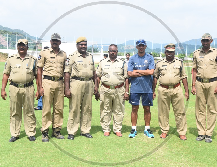 Rahul Dravid posing for a picture with policemen in the Cricket Ground