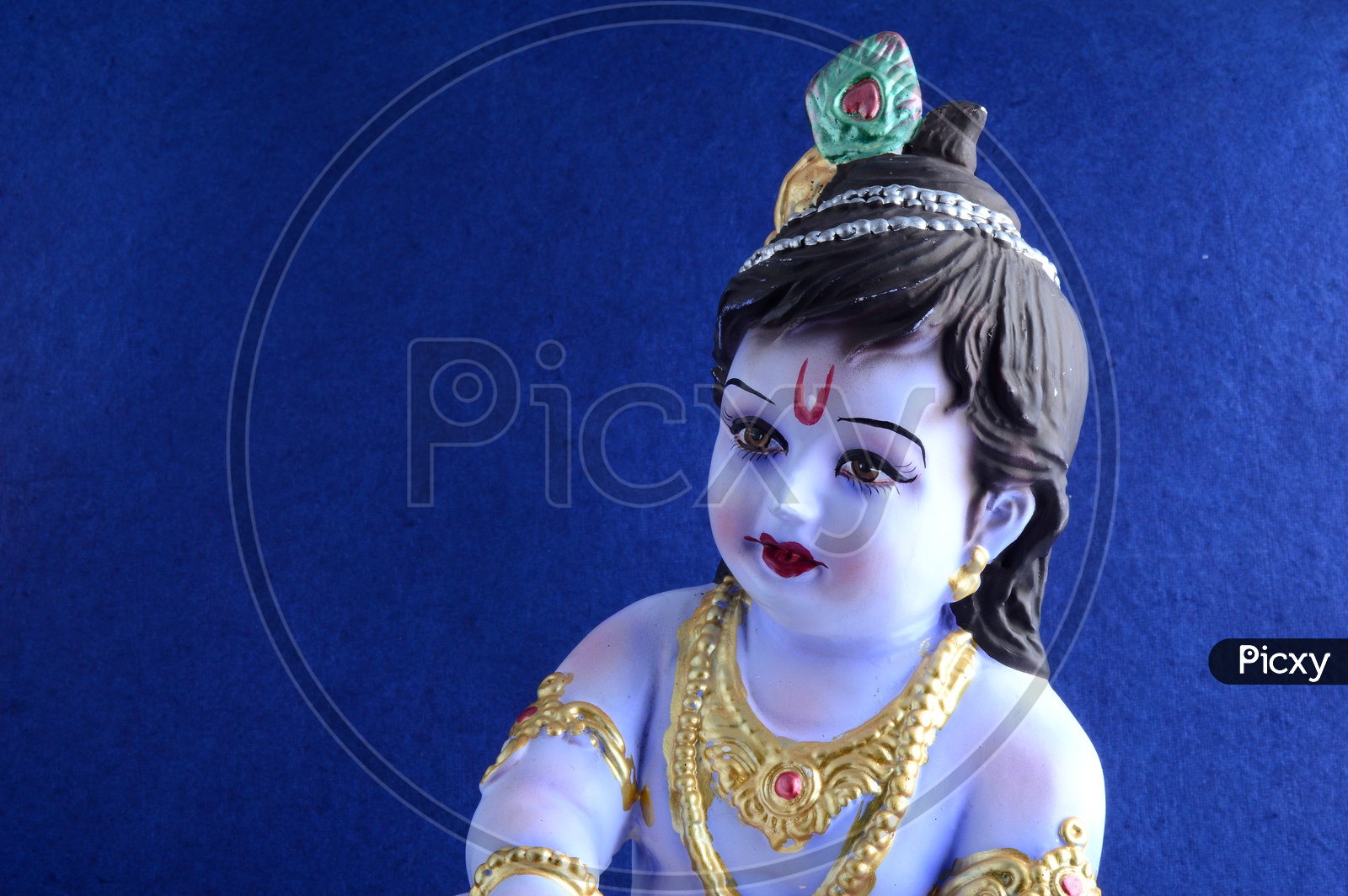 Image of Little Krishna Idol on dark blue background-GH280817-Picxy