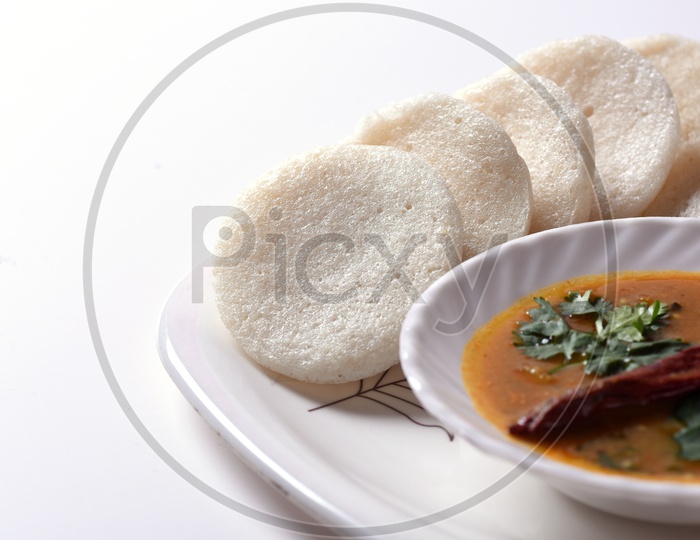 Idli with Sambar in a bowl