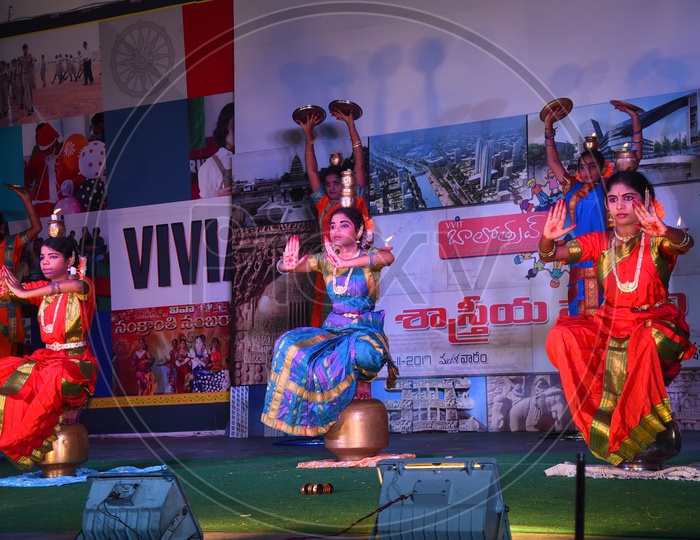 Bharathanatyam Dancers Performing On Stage