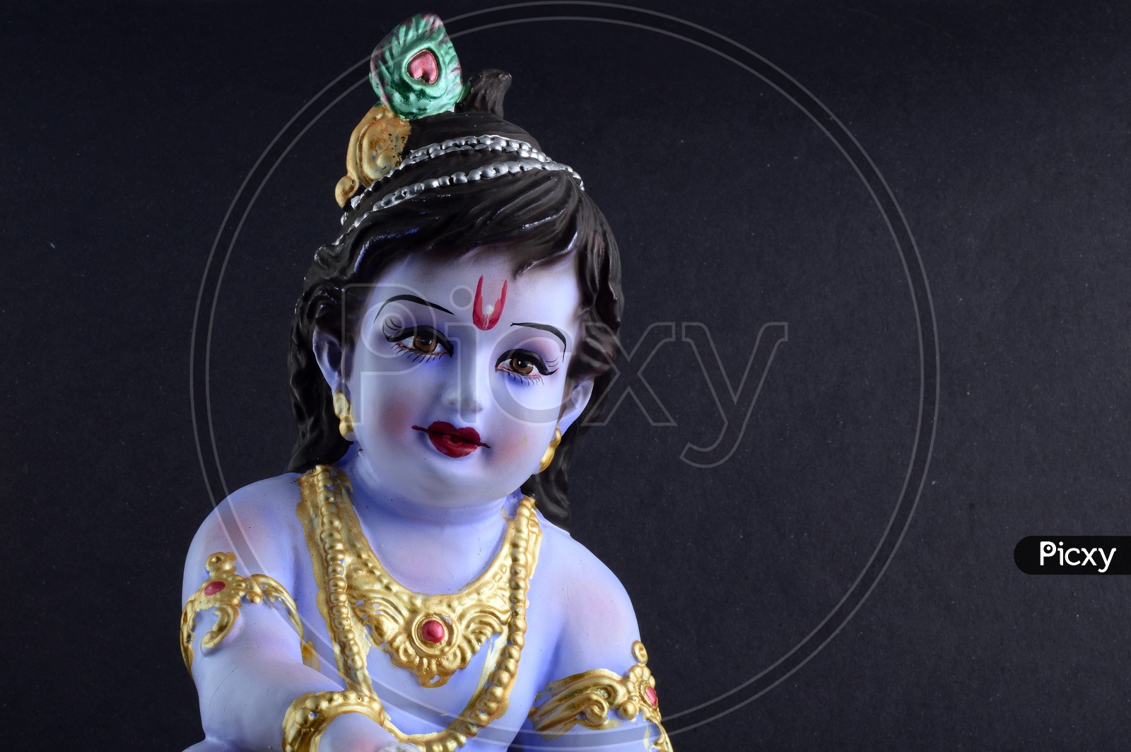 Image of Little Krishna Idol on black background-YQ551065-Picxy