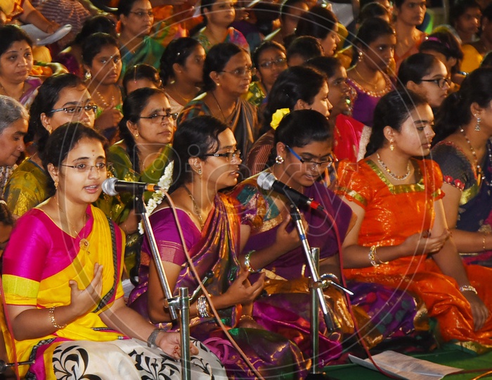 Indian women singing kirtans