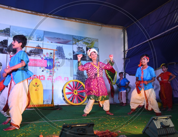 Children perform a dance as part of Balotsav at Vijayawada