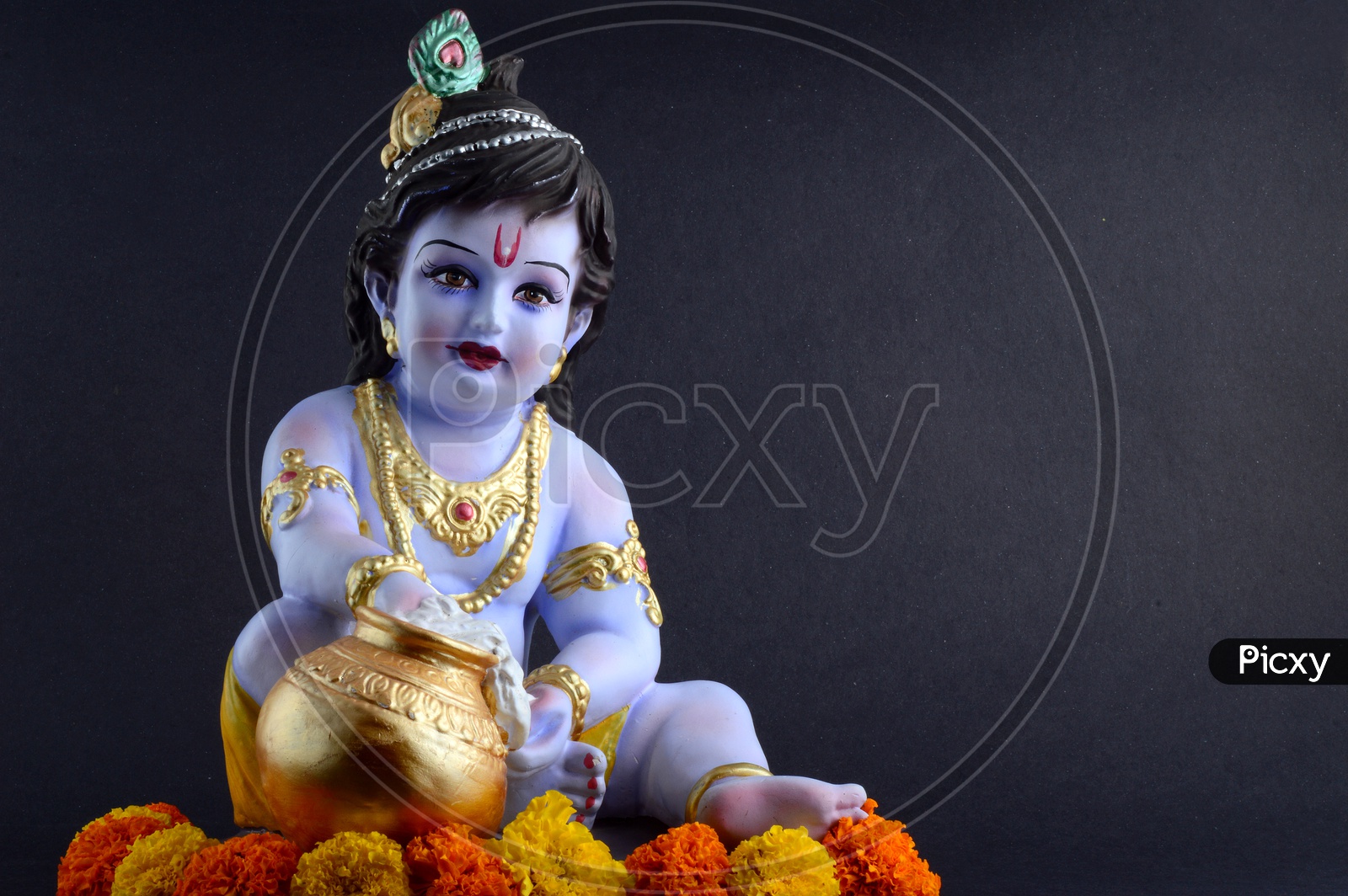 Image of Little Krishna Idol on black background-BL835545-Picxy