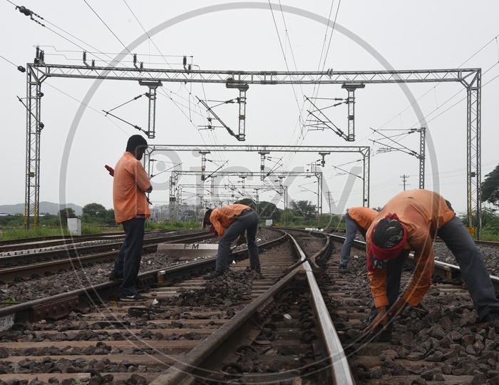 Image of Trackmen working on the railway tracks-PQ744746-Picxy