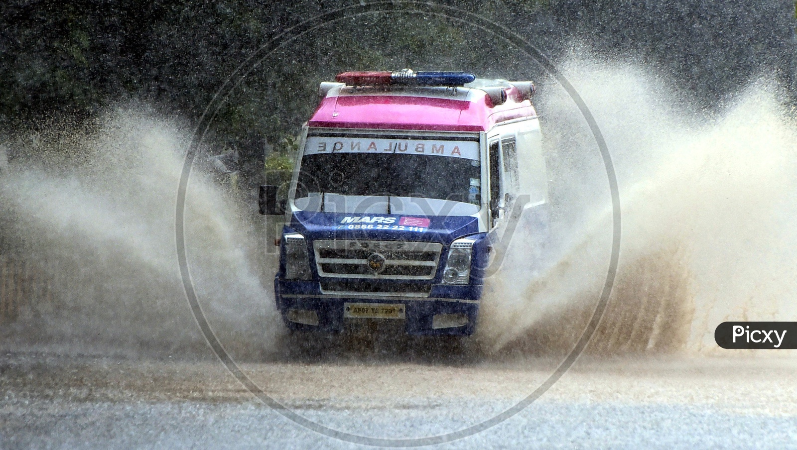 Ambulance on the flooded road