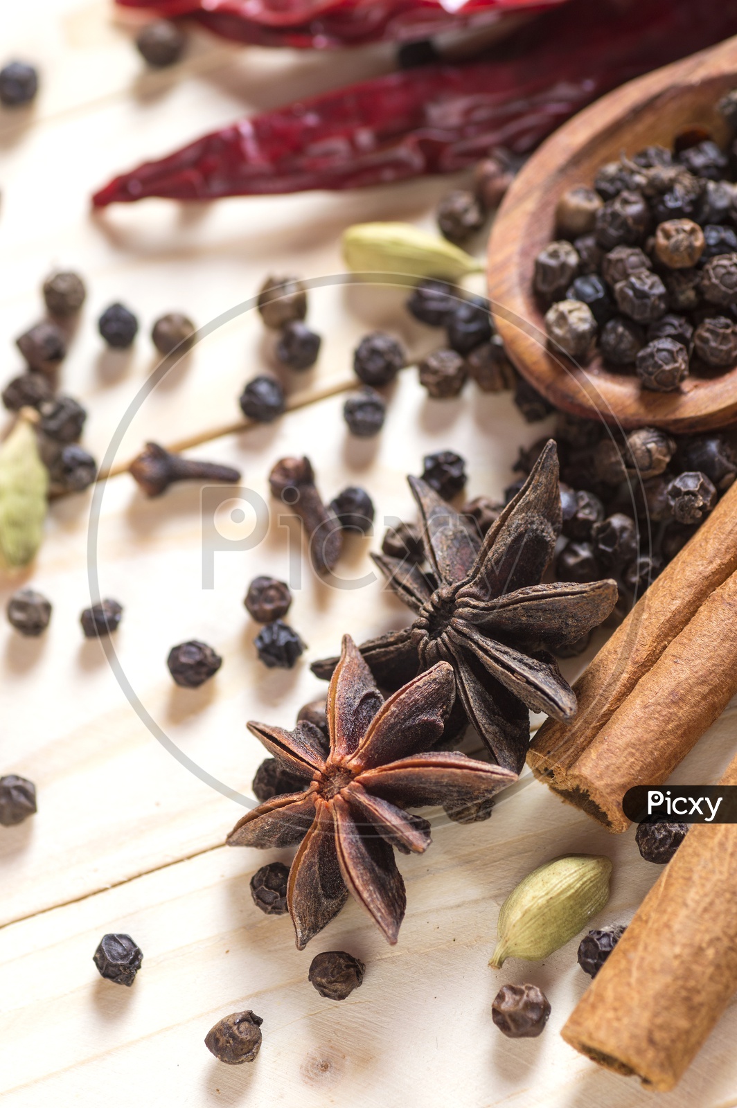 Image of Cinnamon stick, Dried Red Chili, Star Anise, Cloves, Elachi