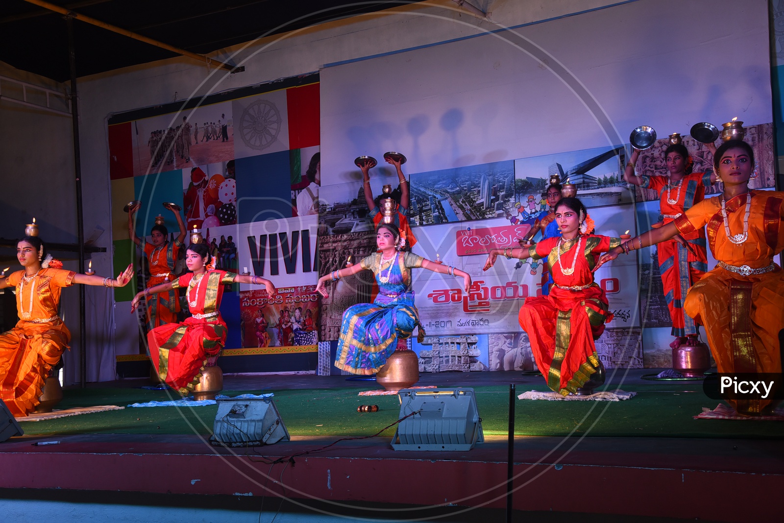 Bharathanatyam Dancers Performing On Stage