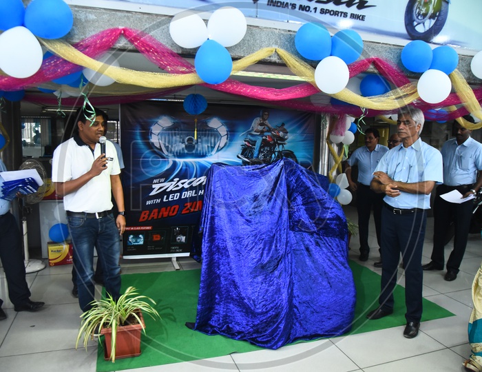 Staff launching the Bajaj Discover motrocycle