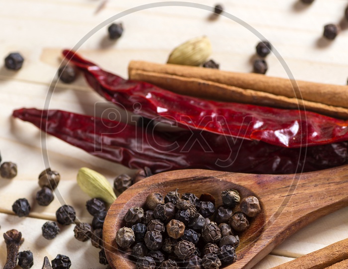 Star Anise, Black Pepper, Cinnamon sticks, Elachi, Dried Red Chili