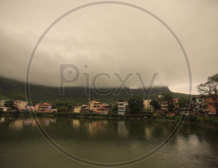 Reflection of Western Ghats In Pond Water
