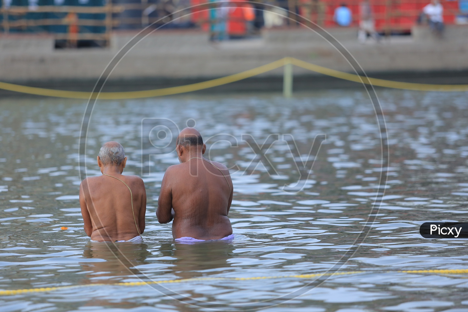 Devotees Taking Holy Bath In River Ganges during Kumbh Mela