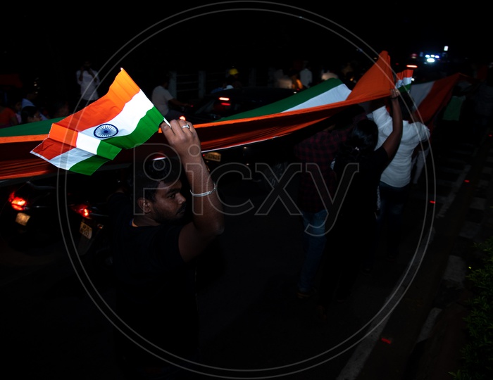 People pays homage to the Martyrs of pulawama attack,by walking around necklace road carrying indian national flag