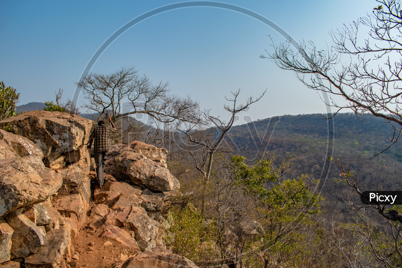 Image of DEVOTEES ON THE HILL TO REACH UGRA STHAMBAM, AHOBILAM, KURNOOL
