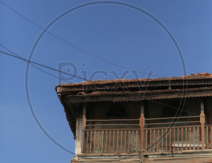 Storey of an old house with gutter tiles roof
