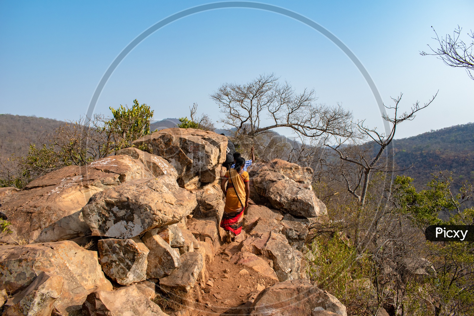 Image of DEVOTEES ON THE HILL TO REACH UGRA STHAMBAM, AHOBILAM, KURNOOL