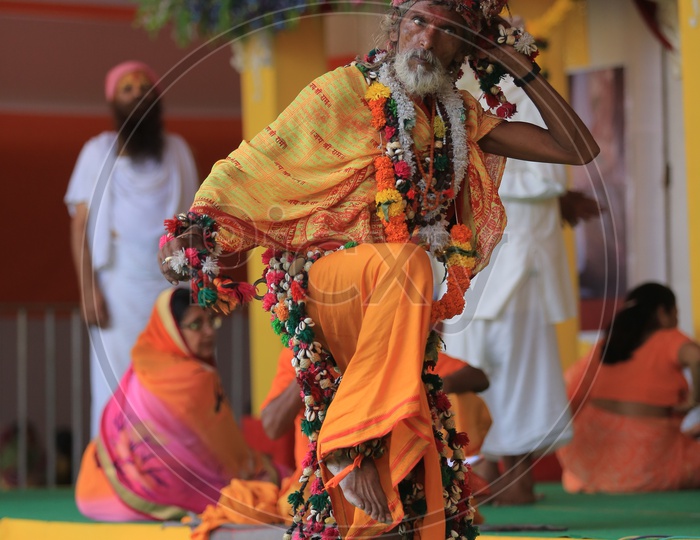 Hindu Sadhu Or Baba  Dancing On Stage During Kumbh Mela