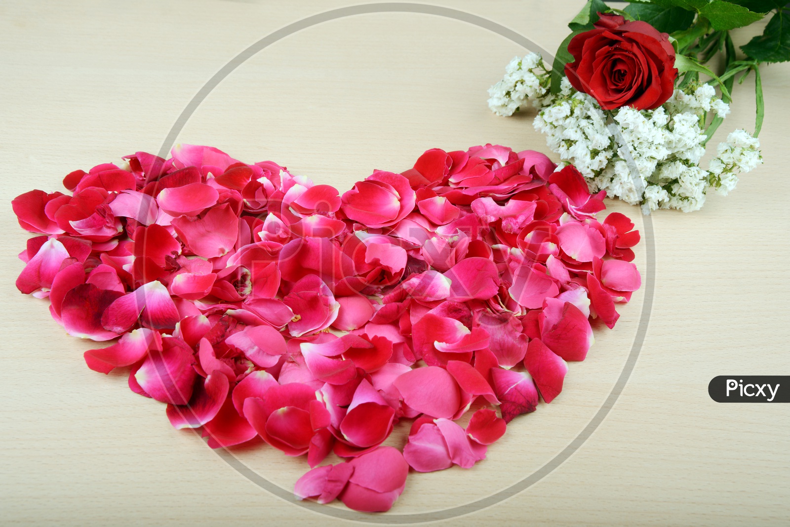 Red Rose petals  in heart shape