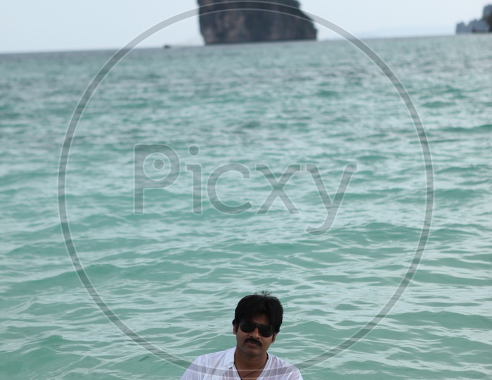Tollywood actor Pawan Kalyan in beach water