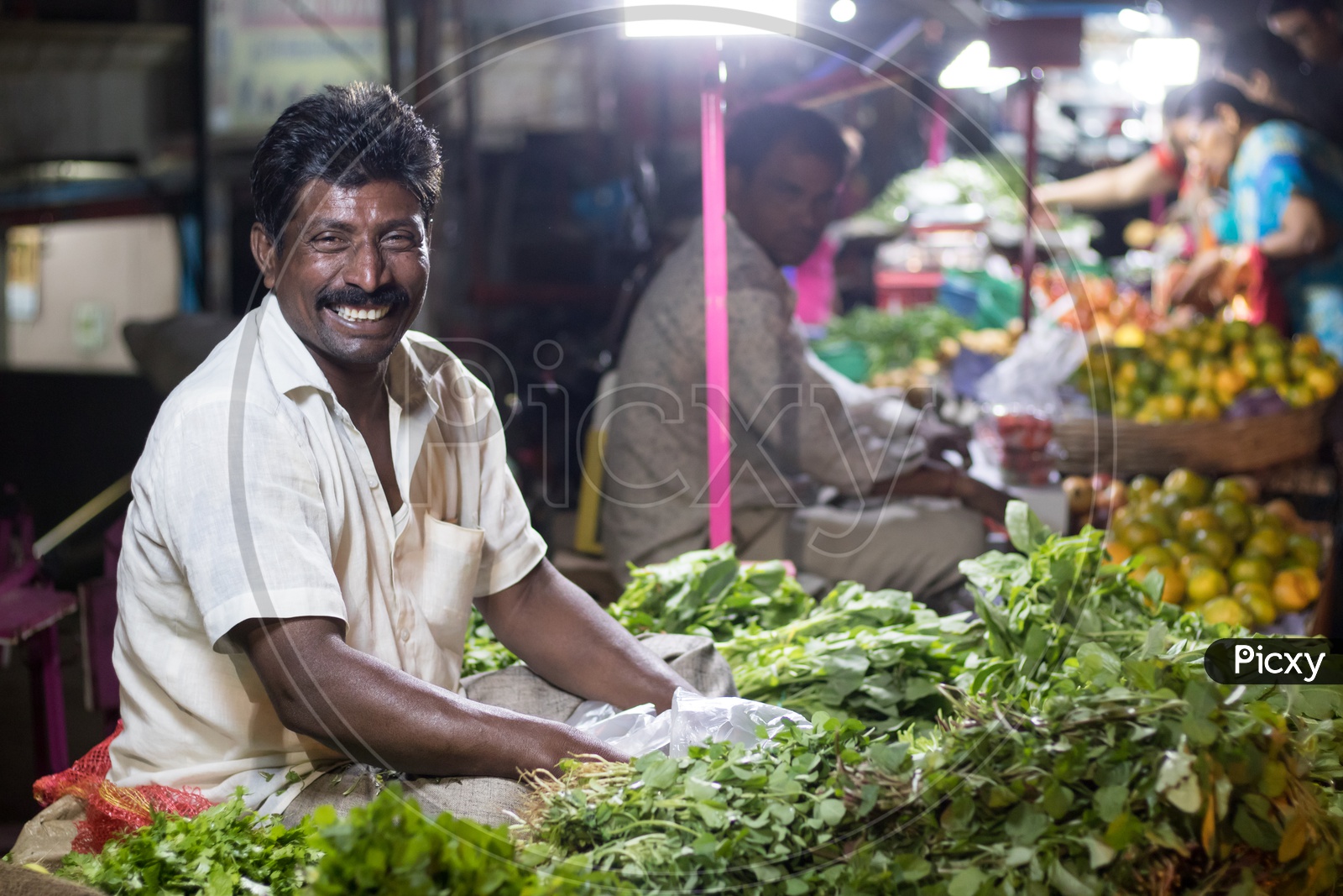 vegetable seller smiling