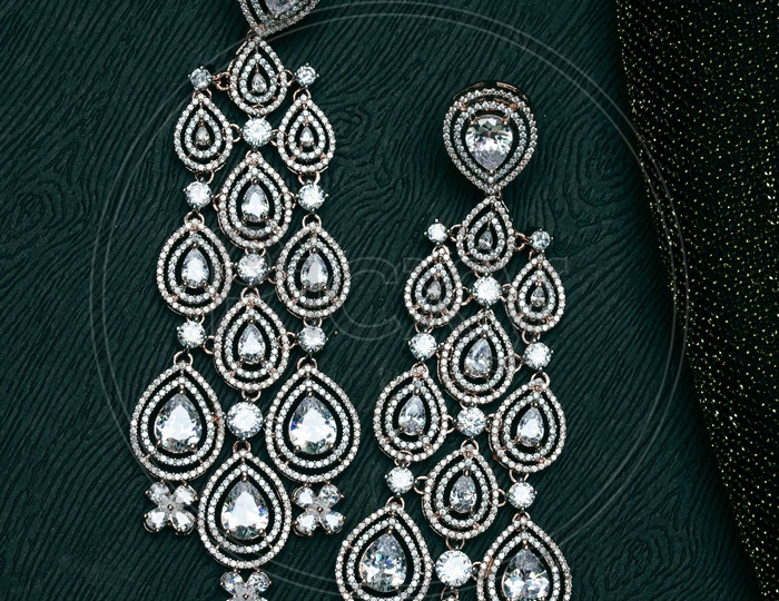 Designer white stone earrings