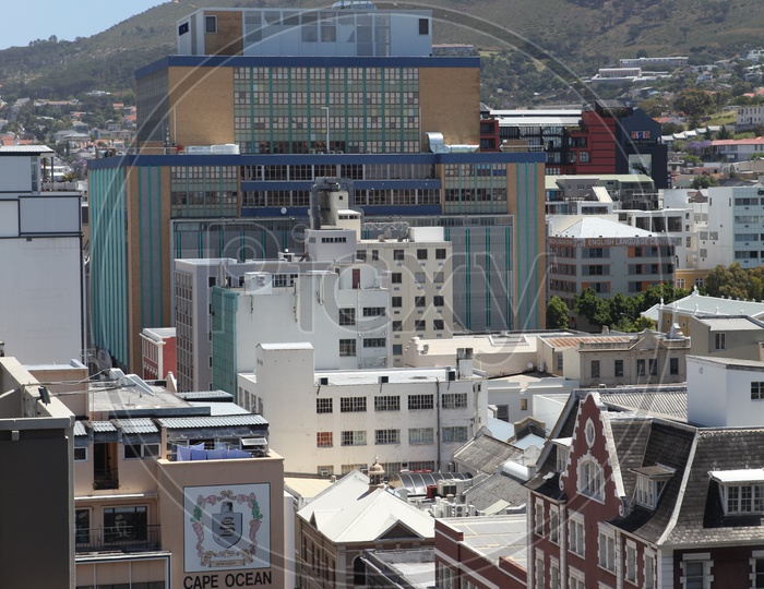 City buildings alongside the Cape Ocean Investment Group