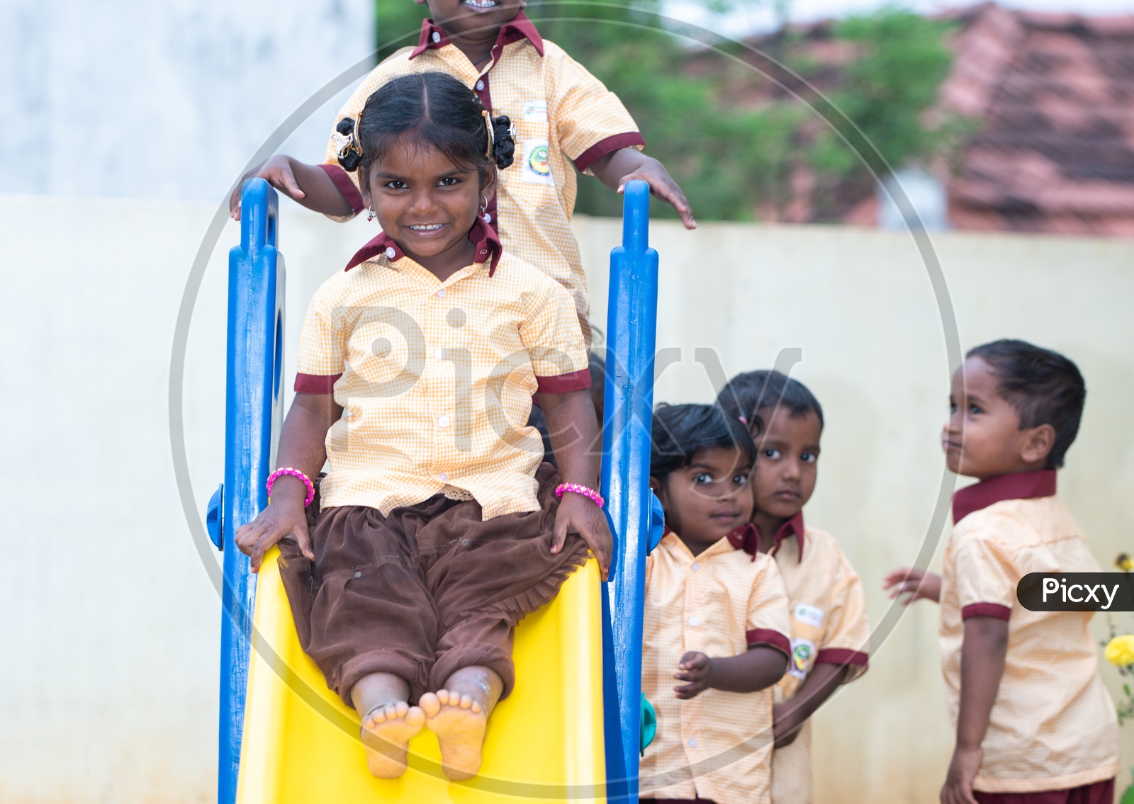 Anganwadi students playing in the ground