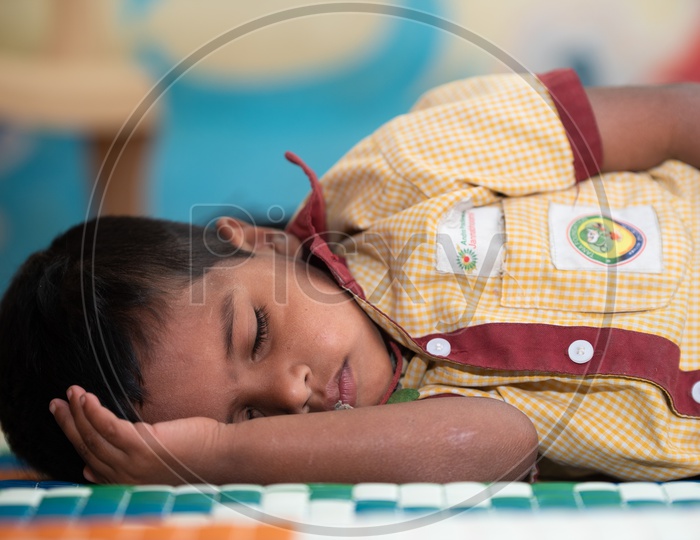 Student taking nap in an Anganwadi center