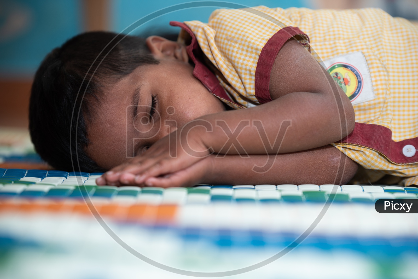 Student taking a nap at an Anganwadi center