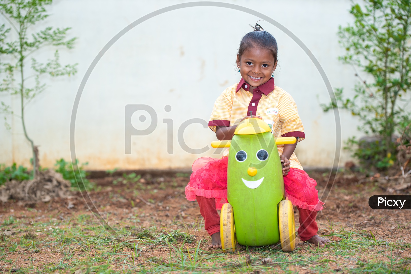 Anganwadi student playing in the ground