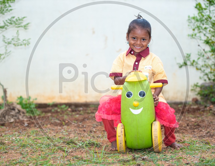 Anganwadi student playing in the ground