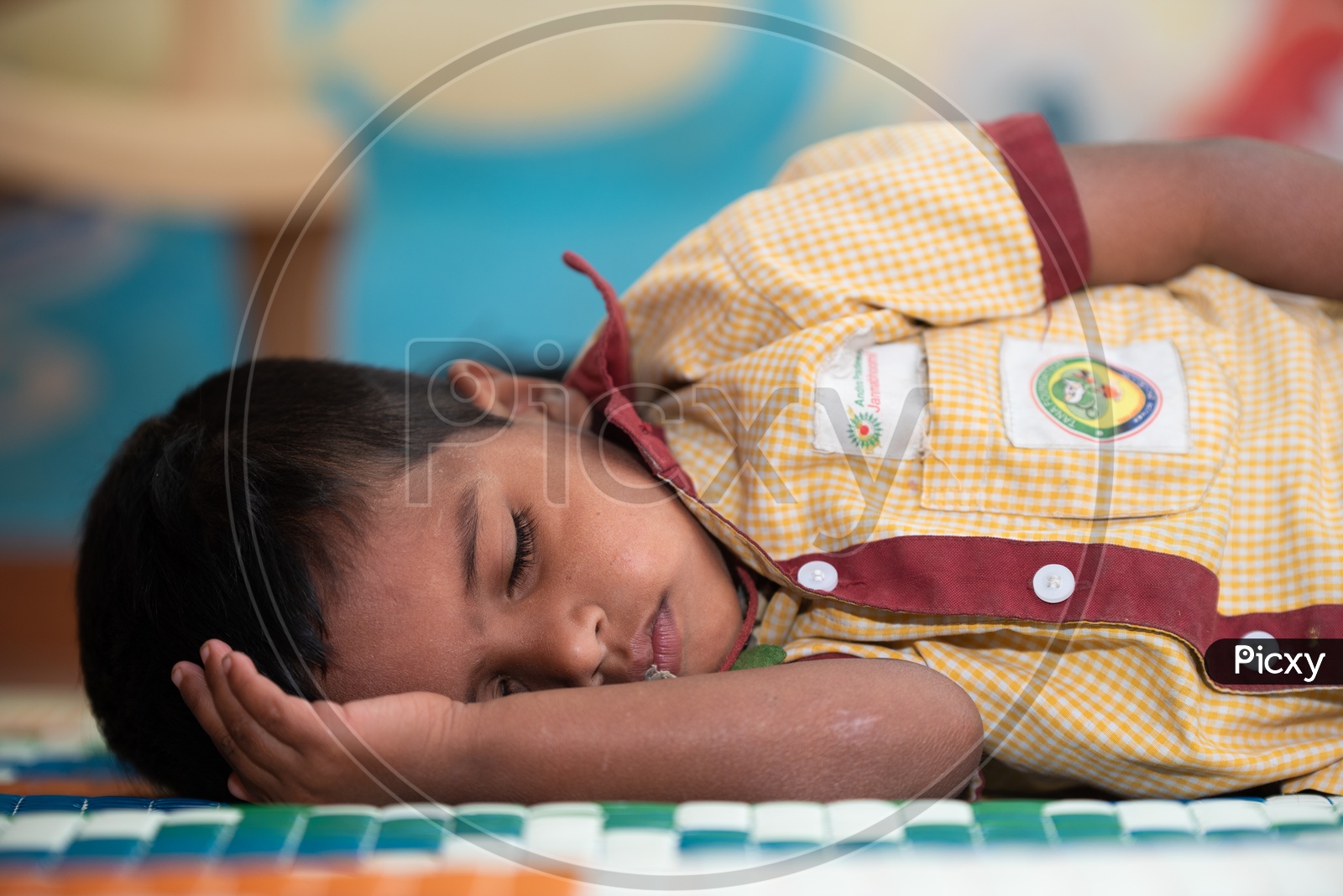 Student taking nap in an Anganwadi center