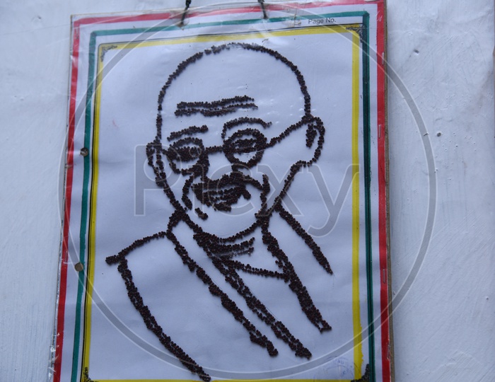 Mahatma Gandhi face drawing by government primary school students using mustard seeds