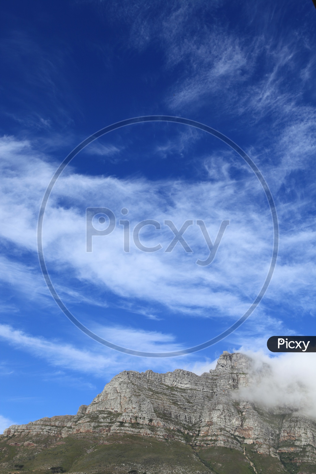 Swiss Alps with cloudy blue sky
