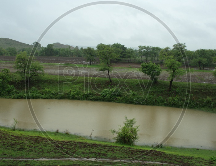 Irrigation canal and agricultural farm lands