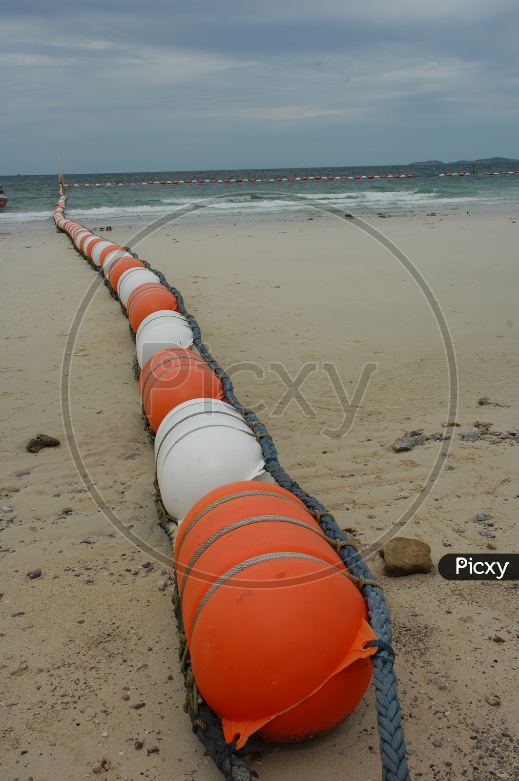 Sea buoy line on the beach