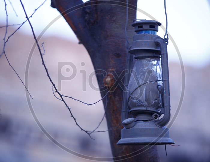 Kerosene Lantern Hanging in Rural Village