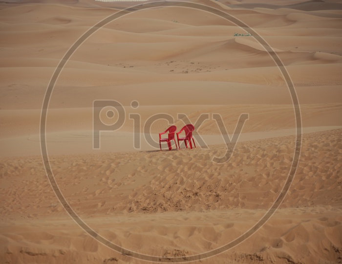 Chairs on the Sand Dunes of Dubai