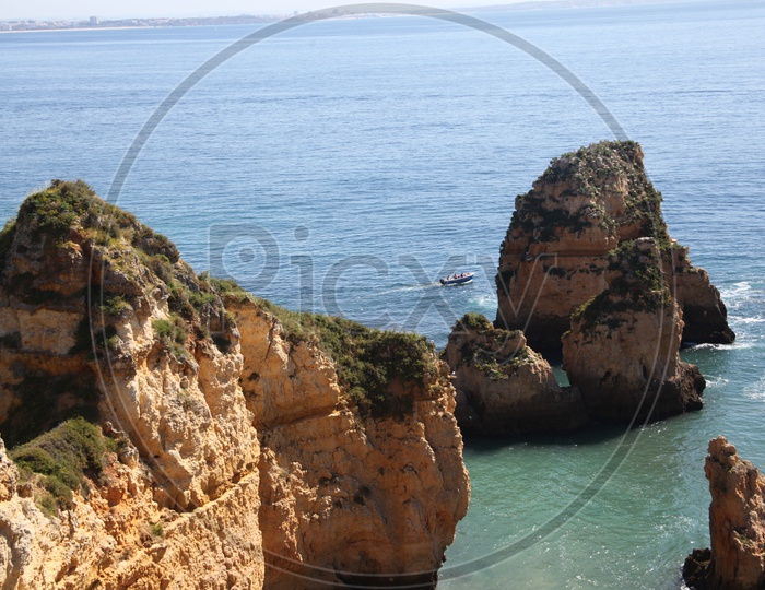 view from a cliff in ponta da piedade