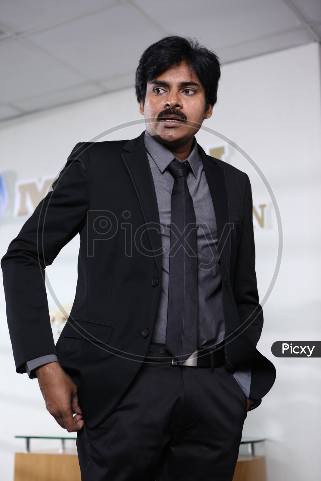 Tollywood Actor Pawan Kalyan in suit and office attire