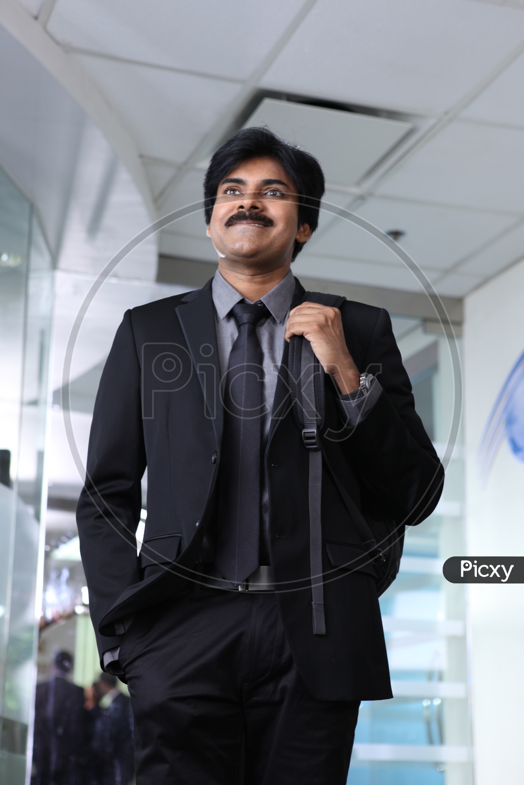 Tollywood Actor Pawan Kalyan in suit and office attire