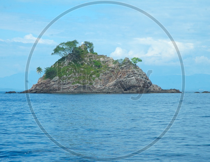 A small island at the center of the sea