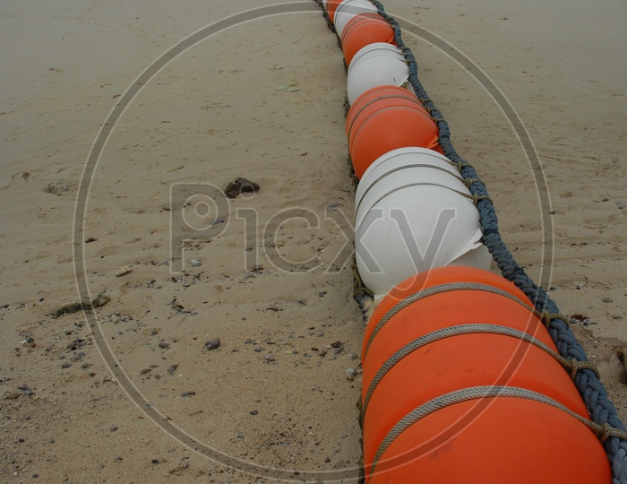 Sea buoy line on the beach