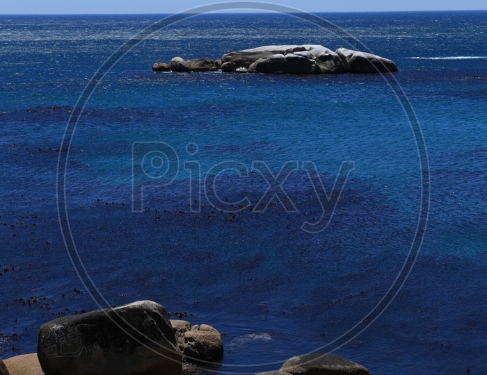Rocks in the blue sea