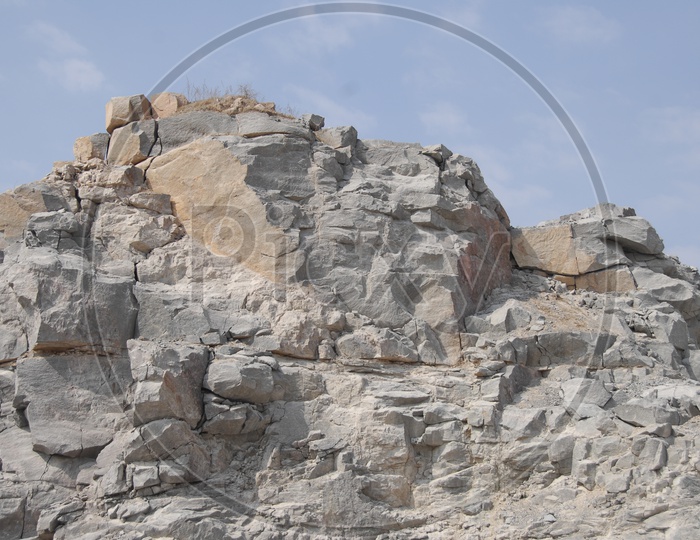 large rocks in an open quarry