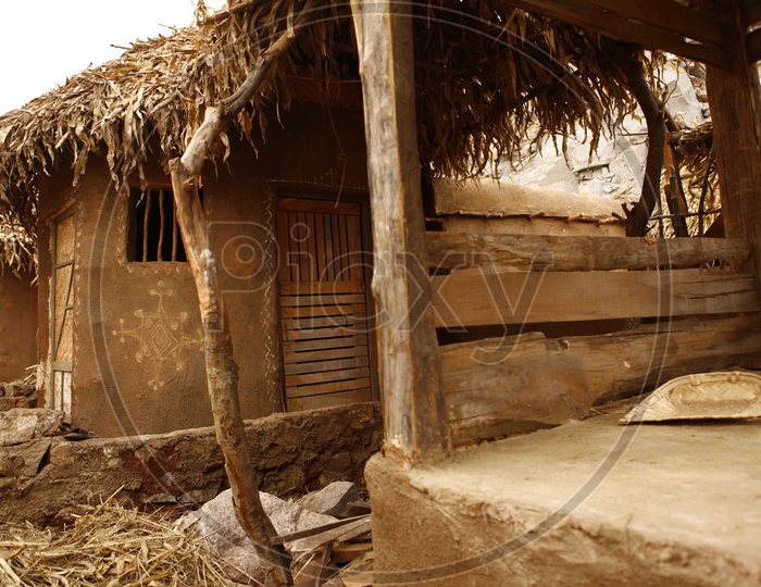 Thatched mud huts in a village