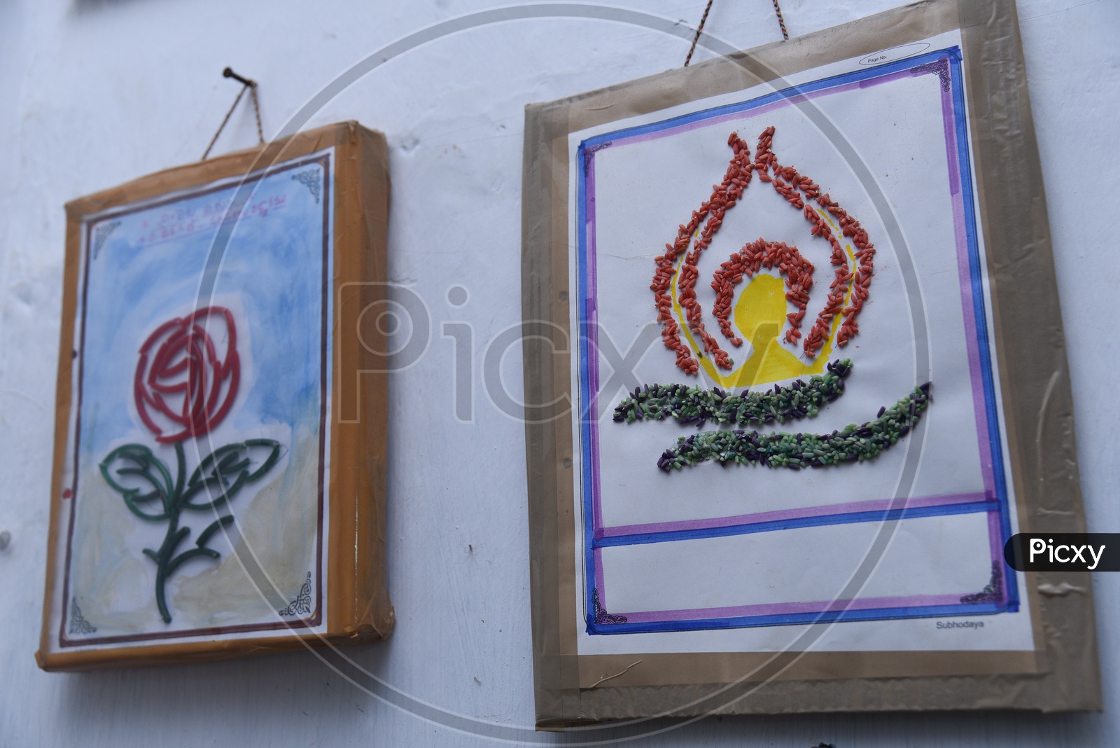 Art by government primary school students using broken bangles and rice grains