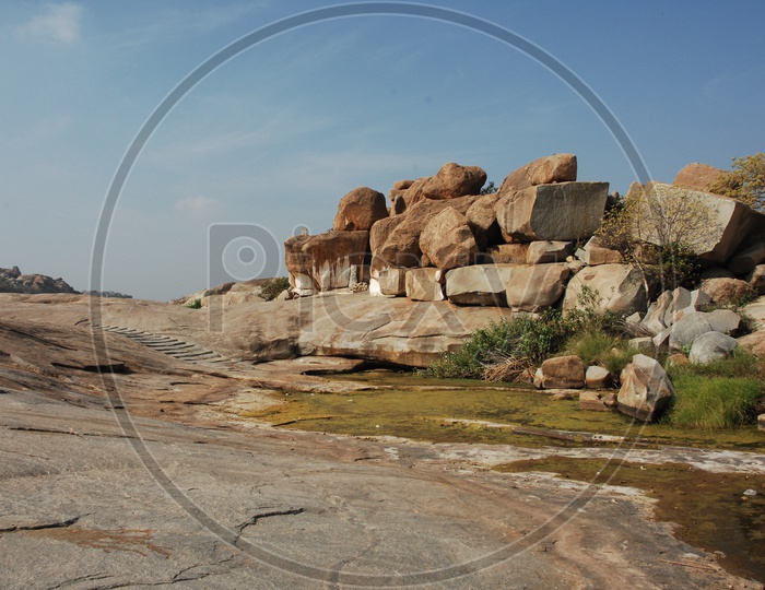 an open area with large rocks